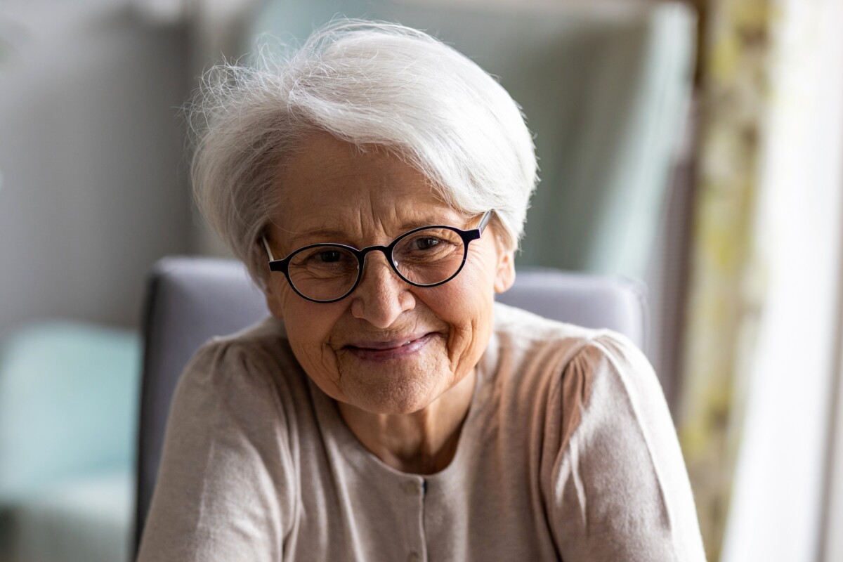 Older woman smiling at home